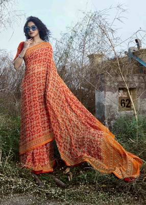 Orange printed georgette saree with blouse 1