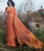 Orange printed georgette saree with blouse
