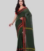 Dark green woven cotton saree with blouse
