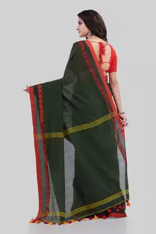 Dark green woven cotton saree with blouse