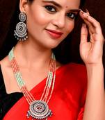 Rose Gold Plated Pink & Green American Diamond Stone Studded Necklace Set