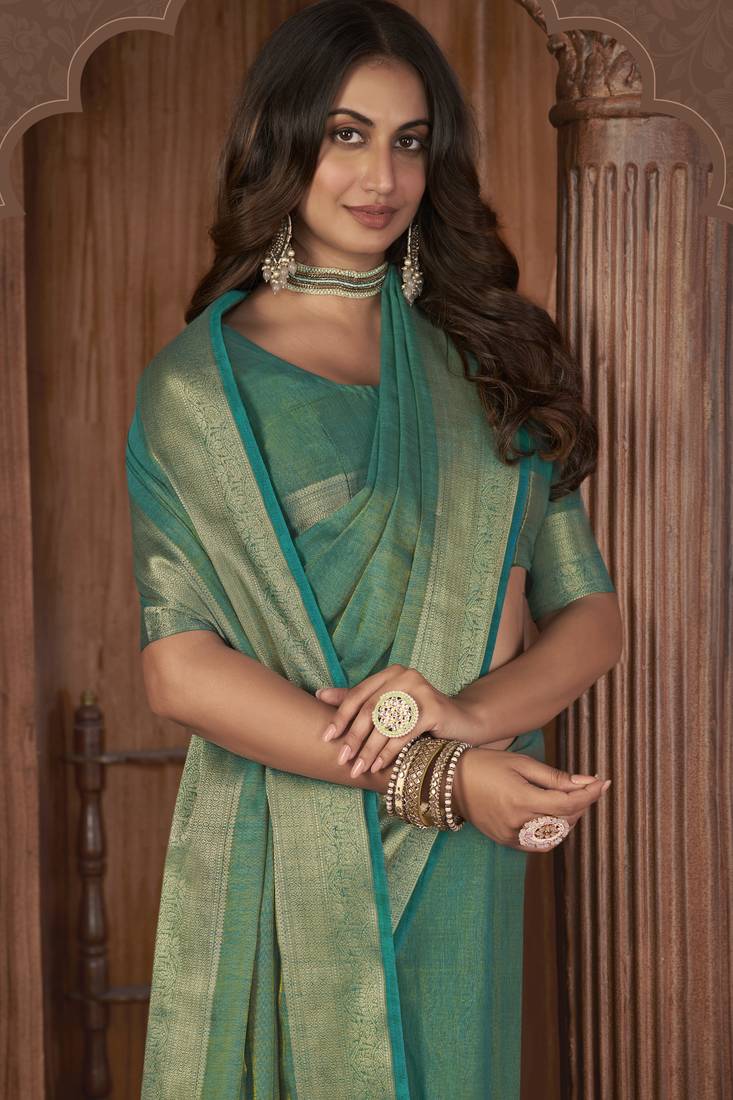 Sea green plain linen saree with blouse