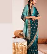 Turquoise printed georgette saree with blouse