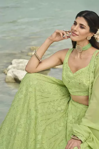 LIGHT GREEN SEQUINS & THREAD EMBROIDERED GEORGETTE FESTIVE BRIDAL WEDDING & PARTY WEAR SEMI STITCHED LEHENGA