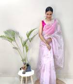 Light pink embroidered organza saree with blouse