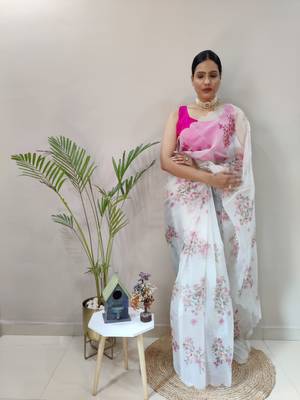Light cream embroidered organza saree with blouse 1