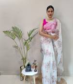 Light cream embroidered organza saree with blouse