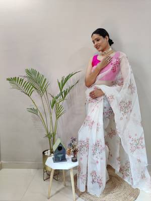 Light cream embroidered organza saree with blouse 3