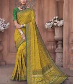 Yellow embroidered silk saree with blouse