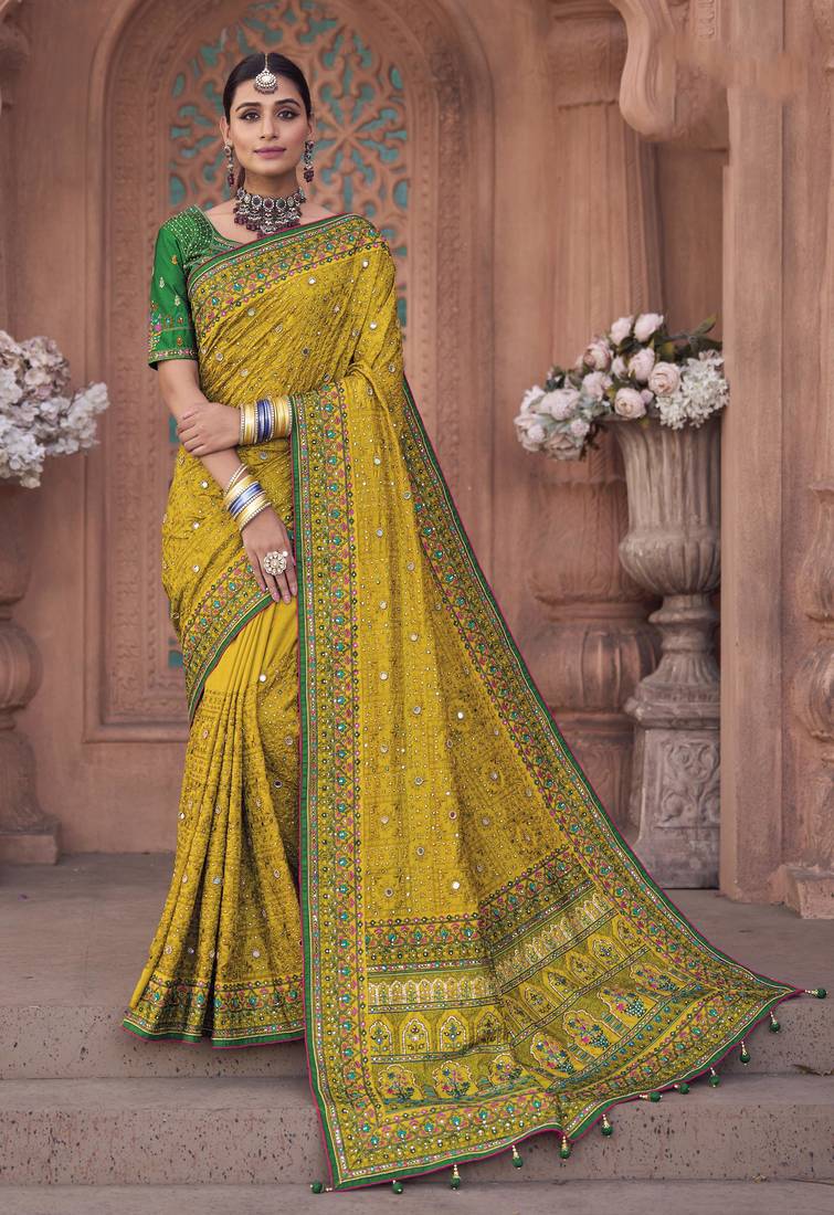 Yellow embroidered silk saree with blouse
