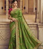 Green embroidered art silk saree with blouse