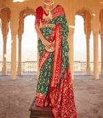 Green printed patola saree with blouse