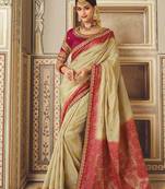 Beige embroidered art silk saree with blouse