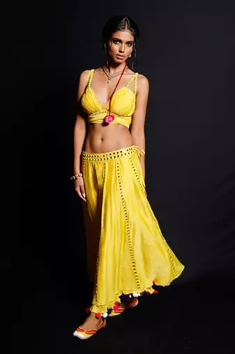 Vibrant Yellow Mirror Work Lehenga Choli with Pom-Pom Detailing