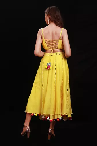 Vibrant Yellow Mirror Work Lehenga Choli with Pom-Pom Detailing