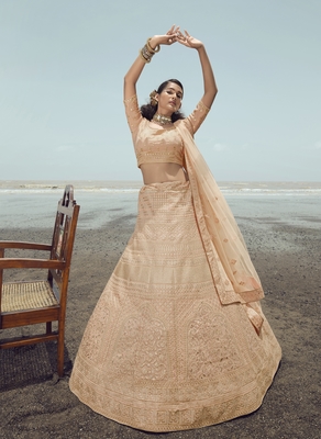 Peach embroidered organza semi stitched lehenga 1