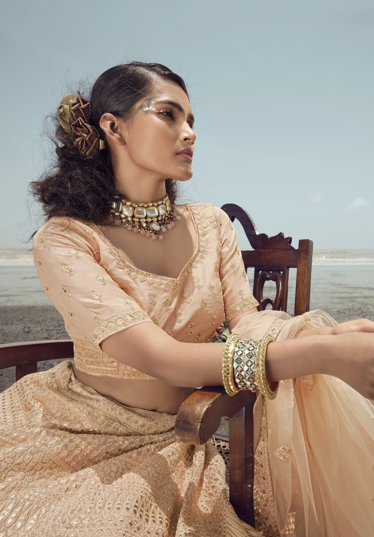 Peach embroidered organza semi stitched lehenga