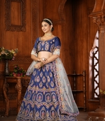 Blue Colour Ethnic Heavy Embroidered Partywear Lehenga