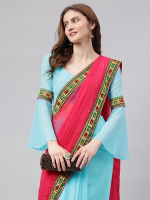 Sky blue embroidered georgette saree with blouse 4
