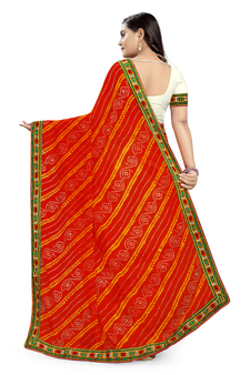 Orange embroidered georgette saree with blouse