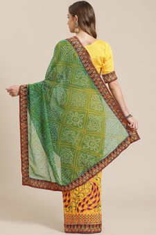 Yellow embroidered georgette saree with blouse