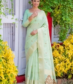 Sea green woven tissue saree with blouse