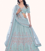 Turquoise embroidered net semi stitched lehenga