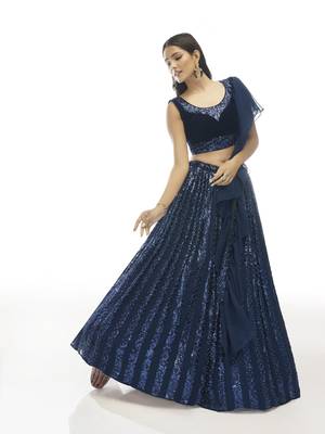 Navy-blue embroidered velvet semi stitched lehenga 2