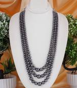 Grey pearl necklaces