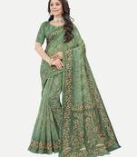 Exclusive Peacock Printed Green Chanderi Silk Blend Saree With Blouse Piece