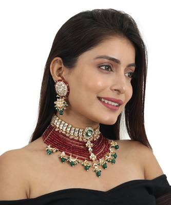 White Choker Set Attached In 8 Line Red Beads With Green Hanging 1