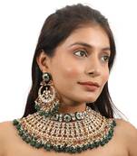 Bridal Necklace Set With Emerald Green And Ruby Pink Stones Embedded With White Jadtar Stones
