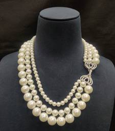 White pearl necklaces