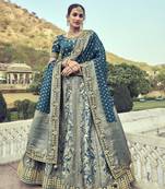 Teal embroidered silk semi stitched lehenga