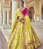 Yellow embroidered silk semi stitched lehenga