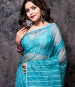 Organza saree with plain blouse