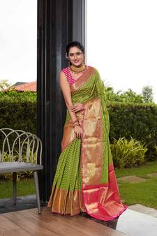 Green hand woven banarasi silk saree with blouse