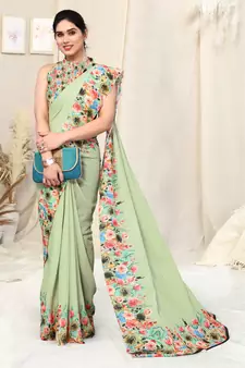 Green printed georgette saree with blouse