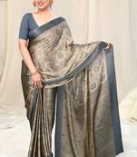Beige printed chiffon saree with blouse