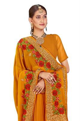 Mustard embroidered georgette saree with blouse 2