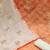 Orange Banarasi Jacquard Unstitched Salwar Suit Dress Material