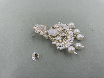 Gold Plated Floral White Kundan Pearls Studded Jhumki Earrings 4
