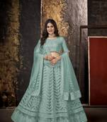 Aqua-blue embroidered
 net semi stitched lehenga