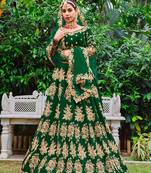 Dark-green embroidered velvet semi stitched lehenga
