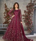 Magenta embroidered net salwar kameez