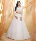 Off white lehenga with a embroidered blouse