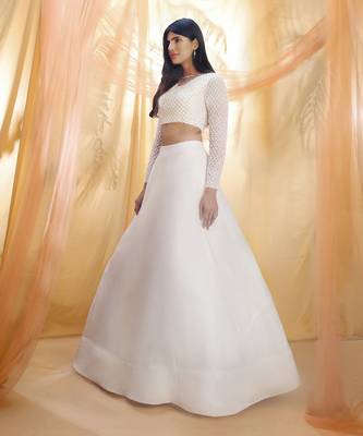 Off white lehenga with a embroidered blouse 2