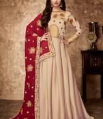 Cream embroidered satin salwar kameez