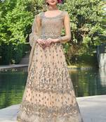 Cream embroidered net salwar kameez