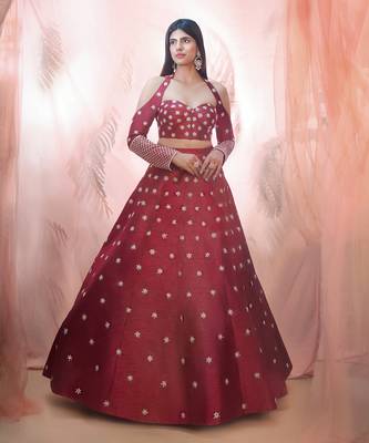 Cranberry lehenga with a corset style blouse 1